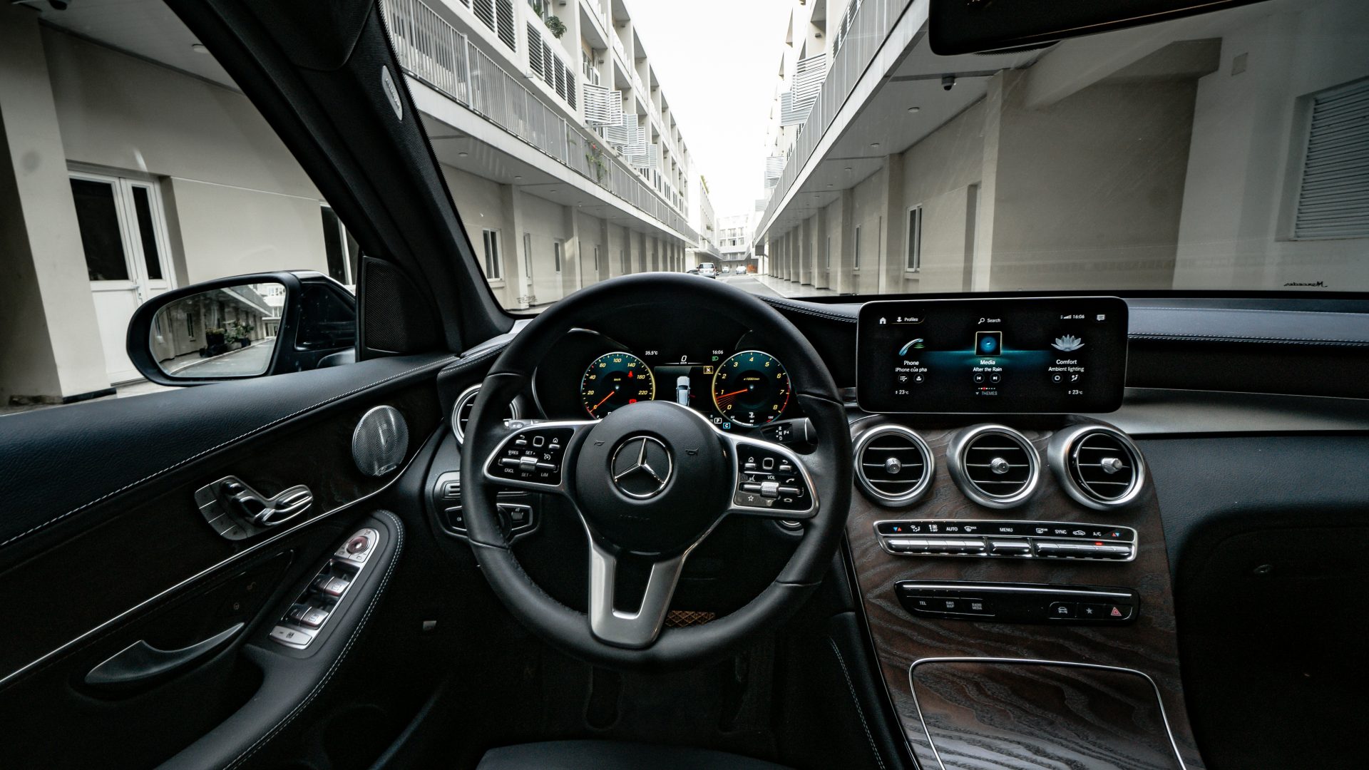 black car interior with digital device